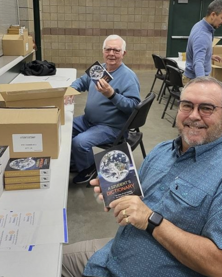 reveille-rotary-claremore-dictionary-donation